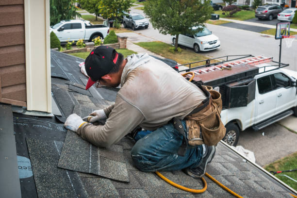 Professional Roofing technician working in Wellsville, KS